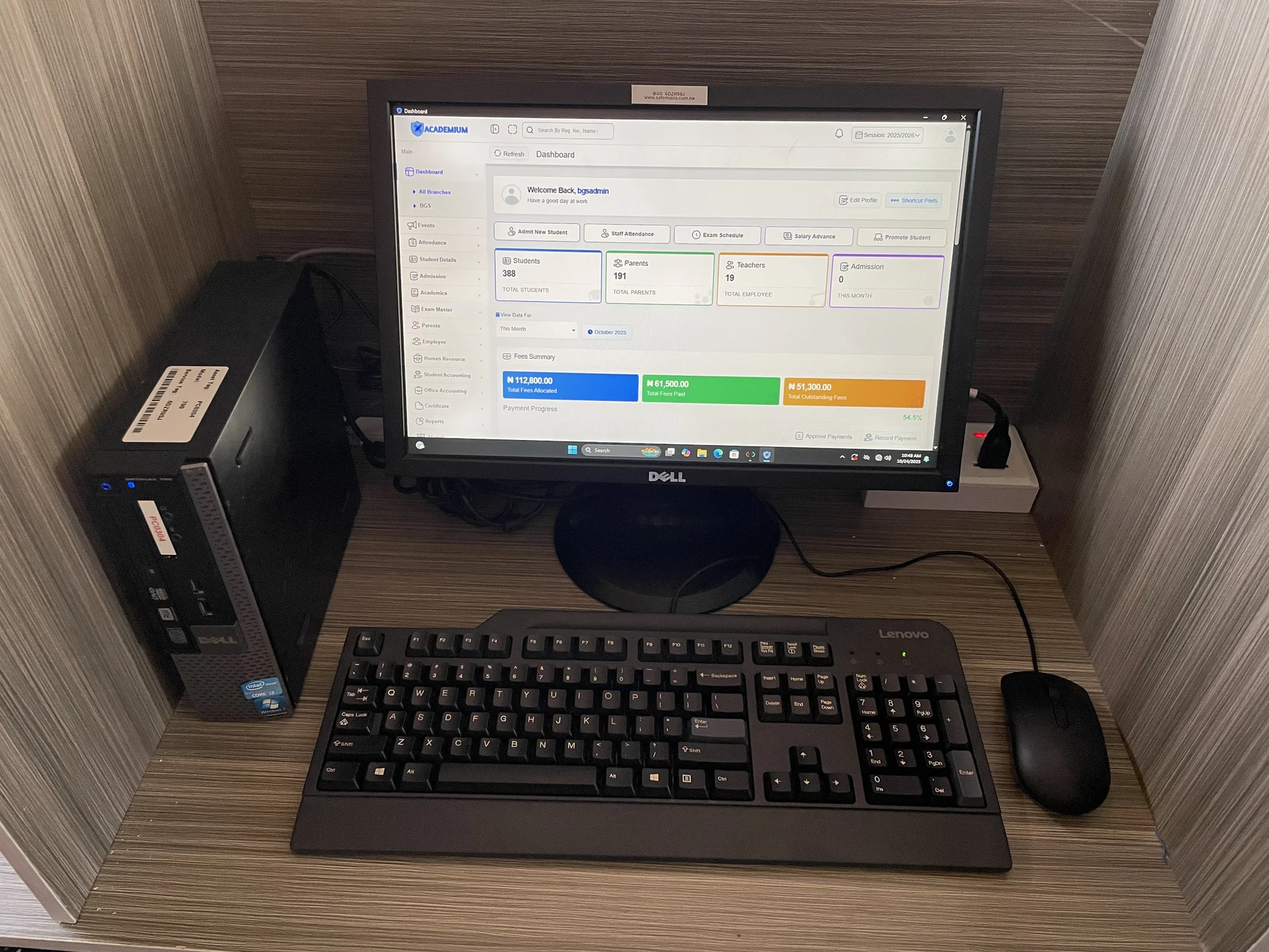 A school workstation set up with Academium, a desktop computer, monitor, keyboard and mouse.